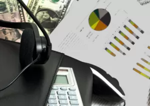 outsourcing-statistic-report-calculator-and-headset