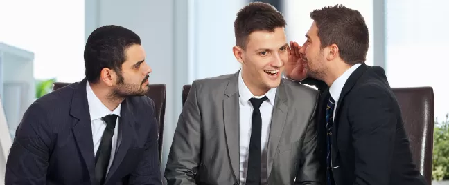 businessmen-gossiping-in-the-office