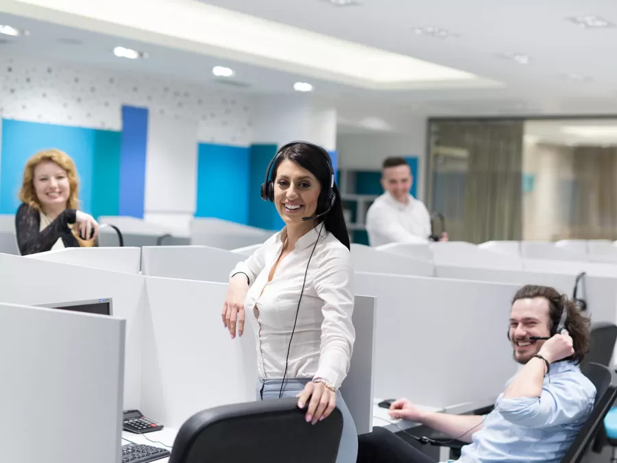 smiling customer service agents in call center in the Philippines