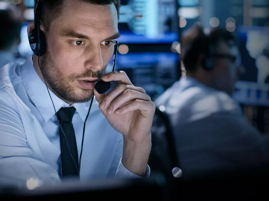 technical support call center agents talking to customer over the phone