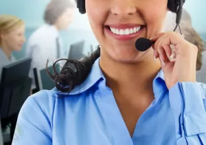 smiling-female-outbound-call-center-agent-team-at-the-back