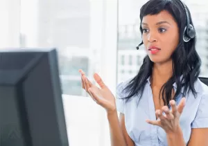 female-telemarketer-talking-to-customer-on-the-phone