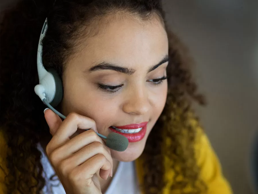 close up customer support representative working in call center