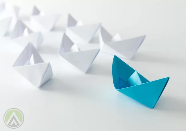 teal-paper-board-followed-by-white-paper-boats