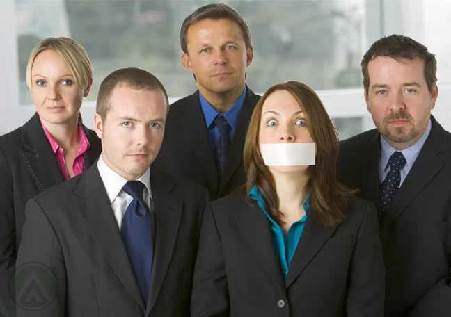 diverse-business-group-businesswoman-with-mouth-covered-by-tape