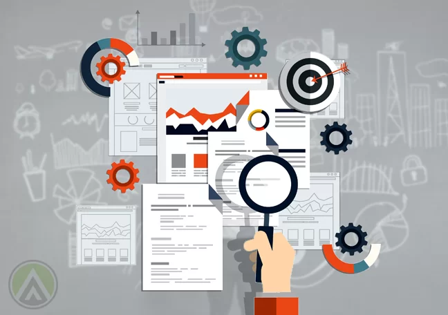 hand-looking-through-magnifying-lense-on-documents-charts-graphs