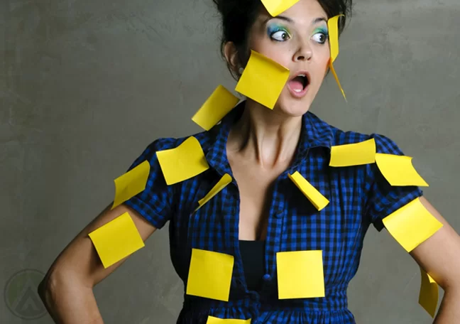 surprised-woman-covered-in-postit-notes