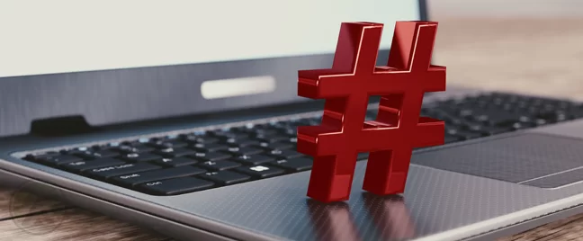 red-hashtag-on-top-of-gray-laptop