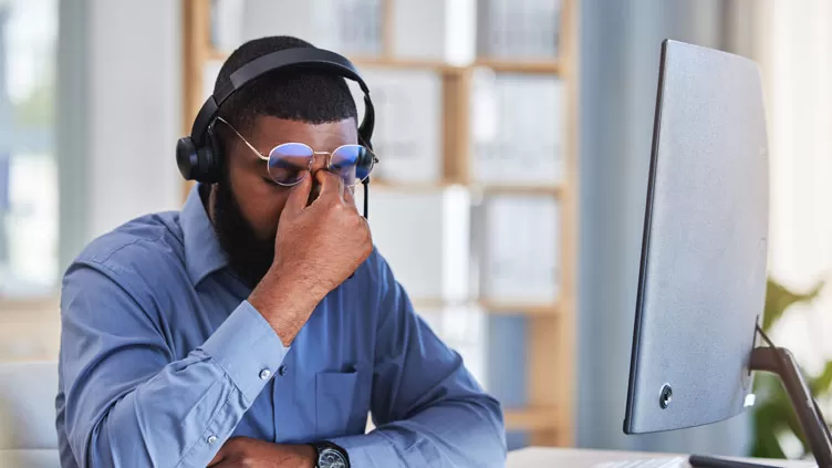 CX rep facepalm headache over technical issues in call center