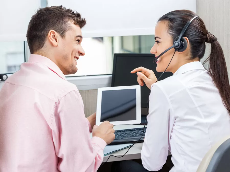 call center agents using tablet laptop computer for customer service
