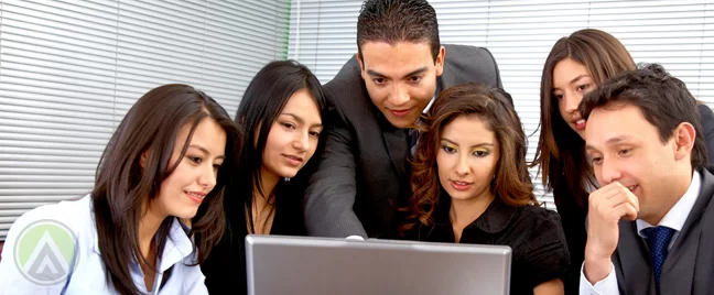 business team trainer corporate training by laptop