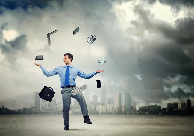 employee cloudy outdoors juggling computer office equipment