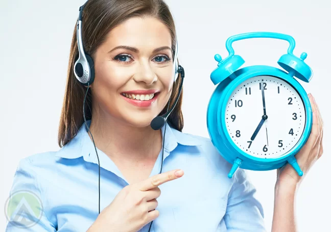 smiling call center agent holding clock