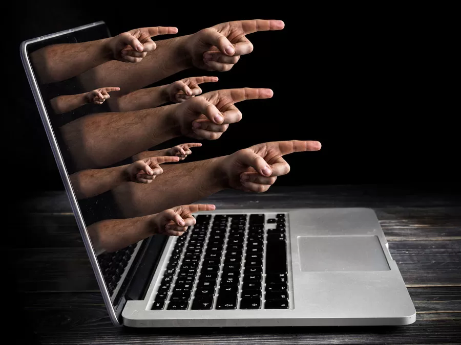 call center nightmares social media backlash depiction accusation hands pointing coming from laptop