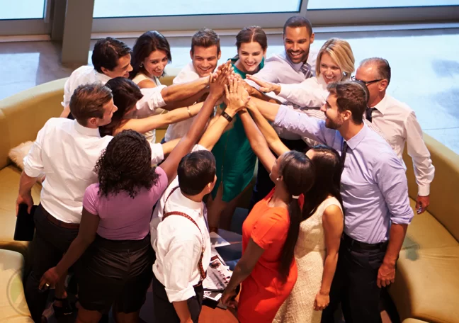 diverse business team hands together teamwork