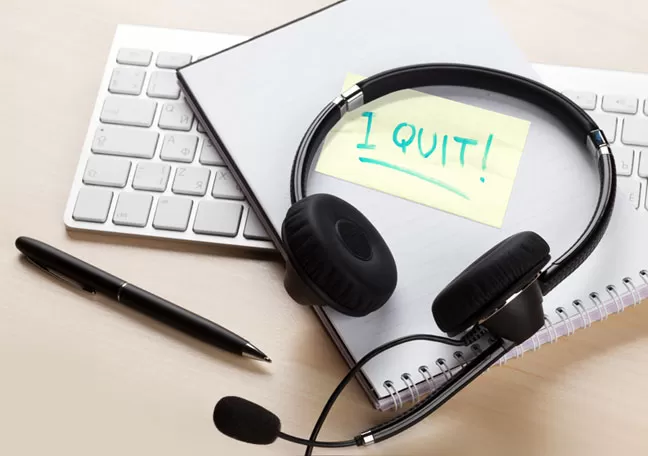 empty call center table headset i quit note