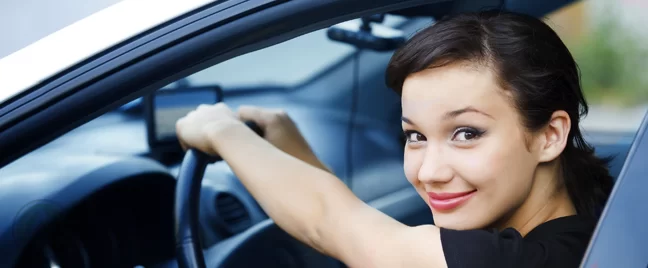 smiling female car driver