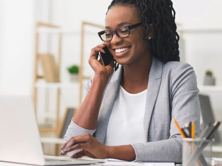 smiling woman glasses excited customer experience call center 