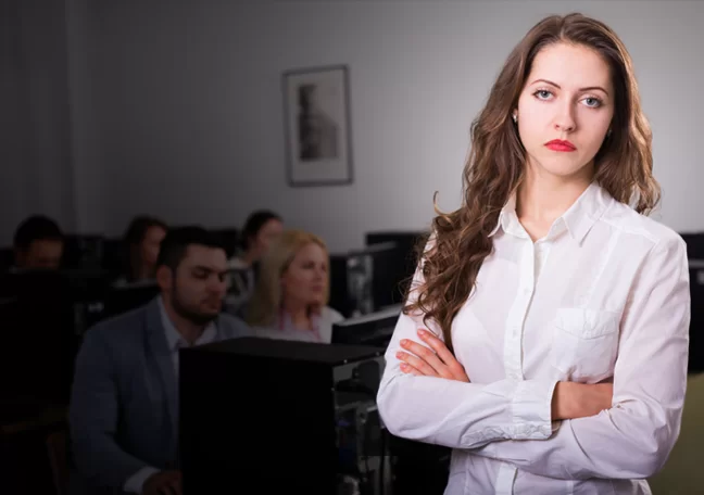 boss looking bored ignoring business team