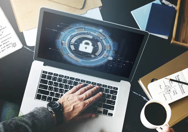 businessman hand using laptop with padlock data security icon on screen