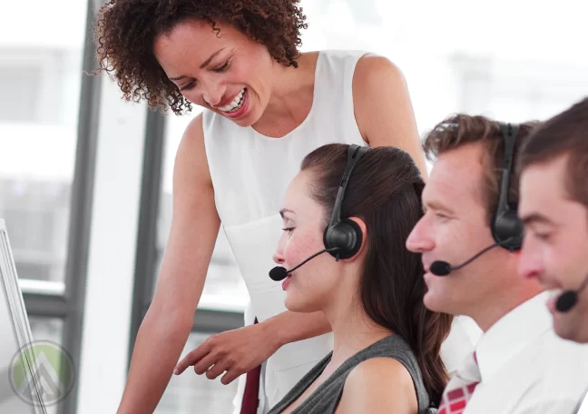 call center manager helping customer service agent