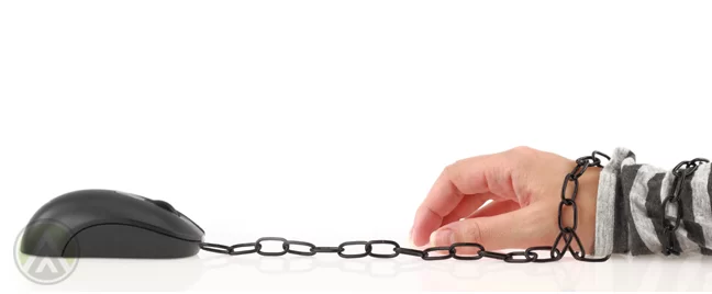 prisoner hand chained to computer mouse