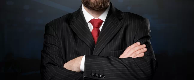 strict businessman crossed arms