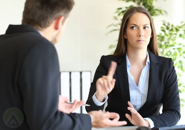 business executive wagging finger refusing partner