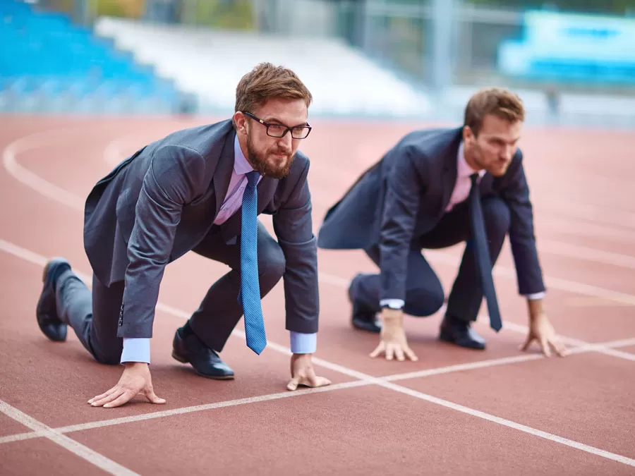 business men rivals in race on running track field