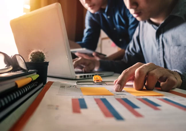 business employees doing market analysis