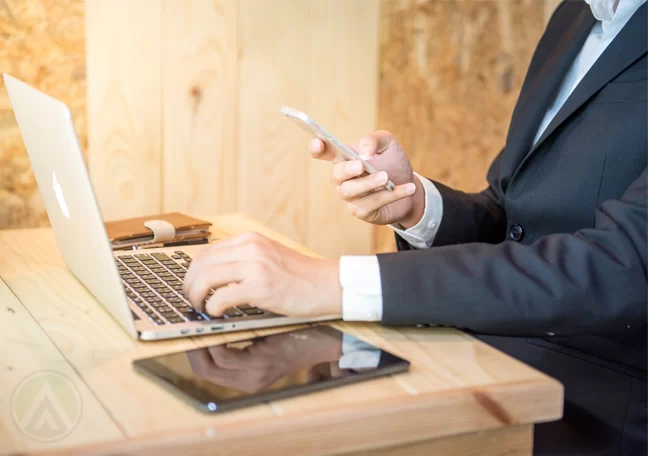 businessman using laptop tablet smartphone