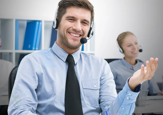 speaking call center rep with hand gestures in a call center