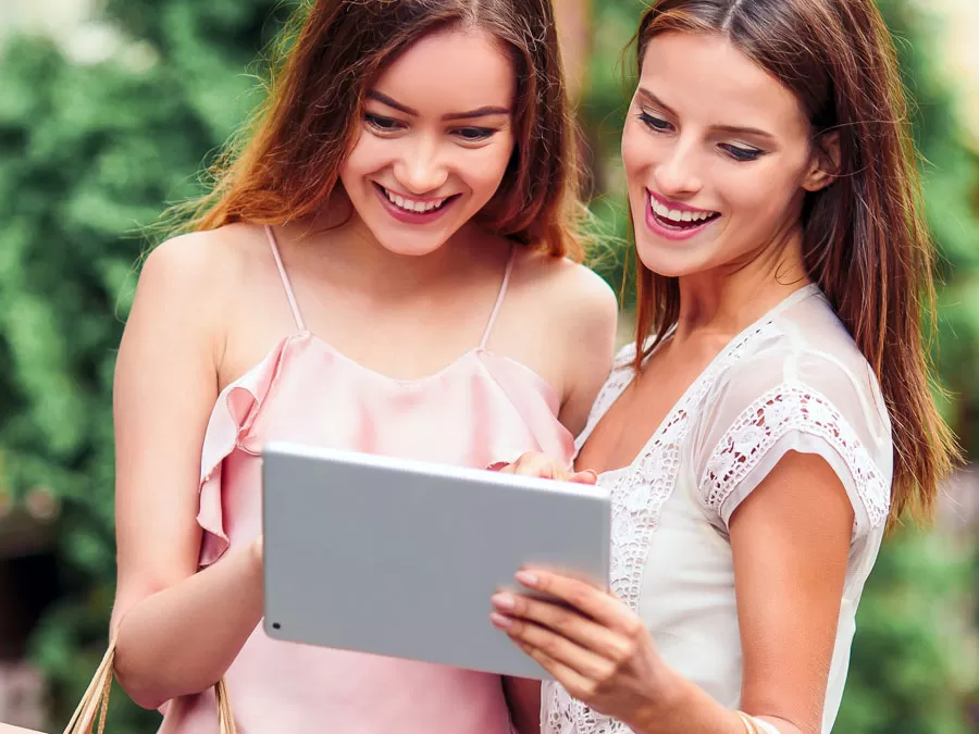 women looking at tablet