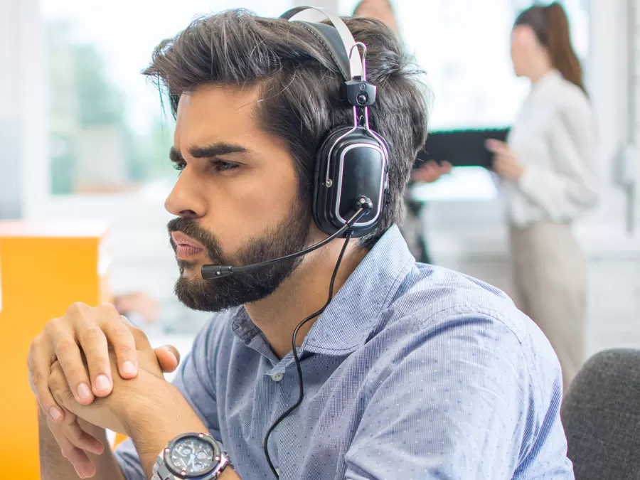 customer care agent listening to phone call