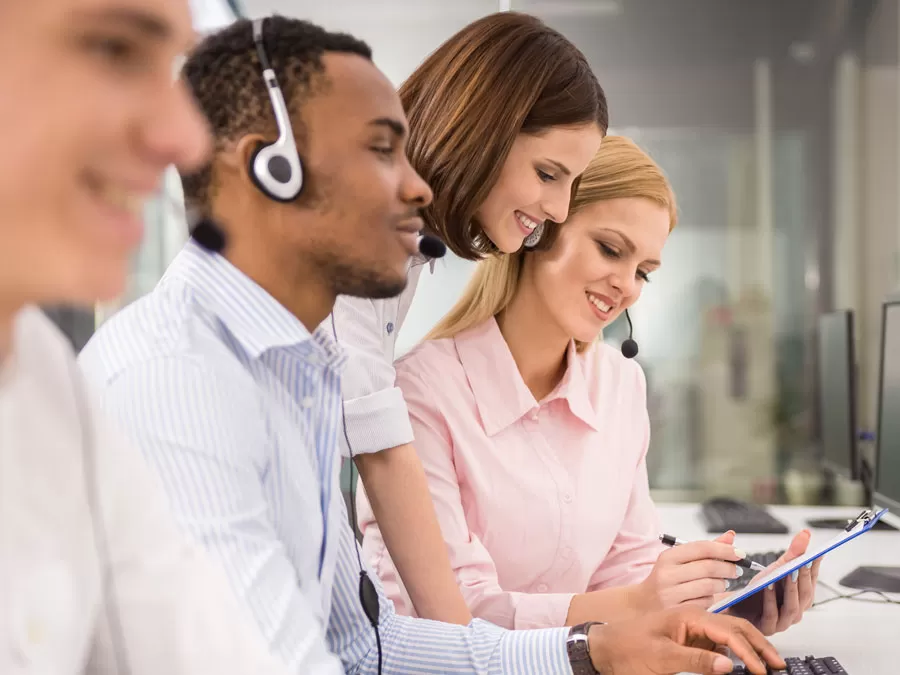 call center team leader helping customer service agents