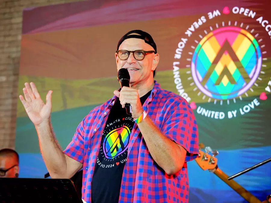 Open Access BPO CEO Ben Davidowitz addresses attendees of the #UnitedByLove Pride Party