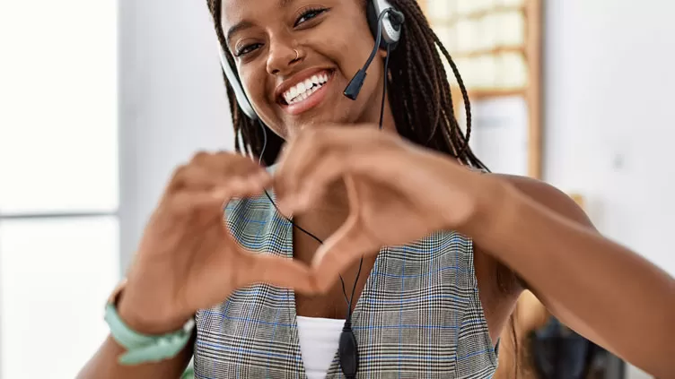 future of customer experience CX Call Center Outsourcing 2025 agent heart hand gesture