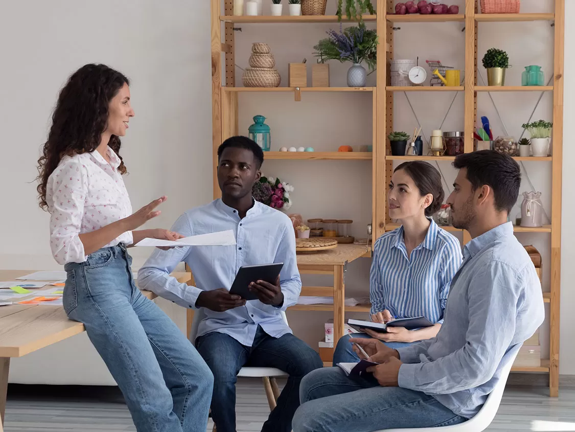 Call Center Agent Experience depiction diverse customer service reps chatting with team leader