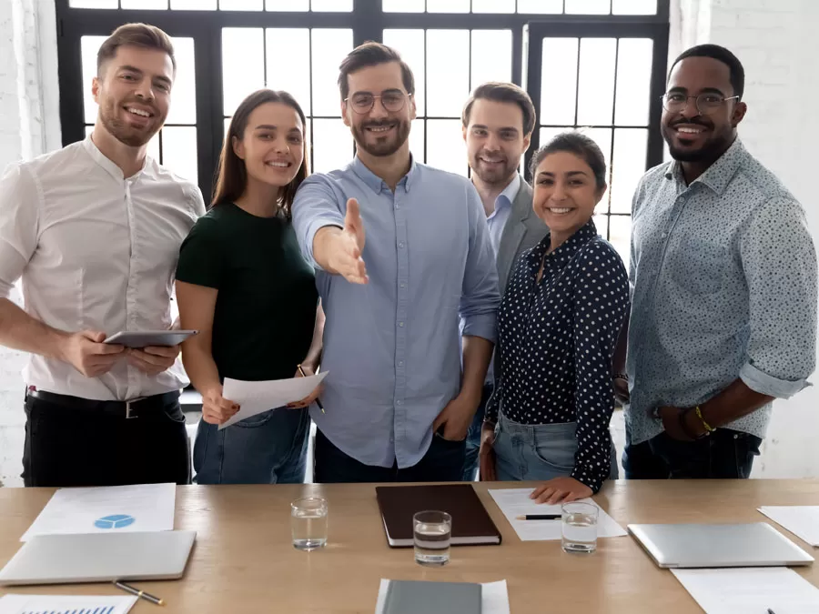 call center recruitment strategies hr human resources extending handshake to camera 