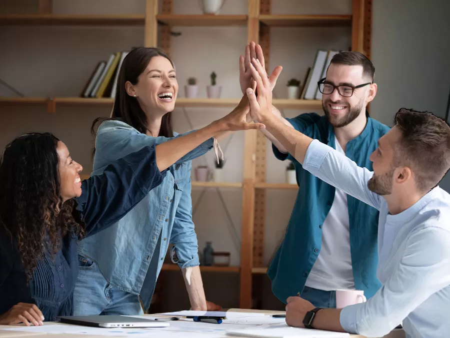 customer service team in high five with marketing department