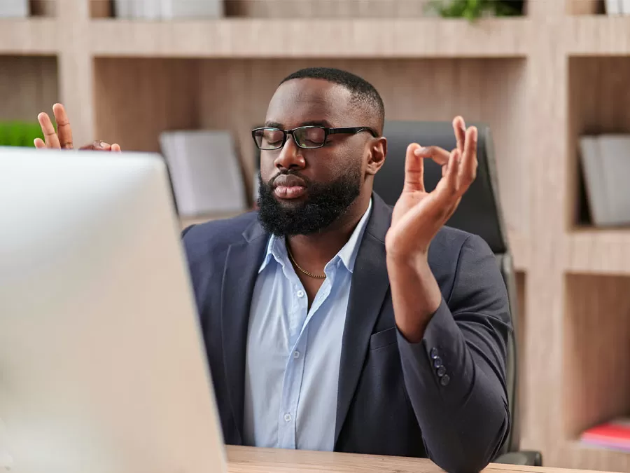 employee self-care in action customer support agent mindfulness yoga in the office